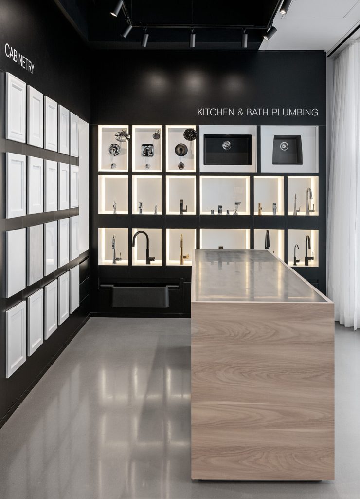 Display of taps and shower fittings in brass, chrome and matt black