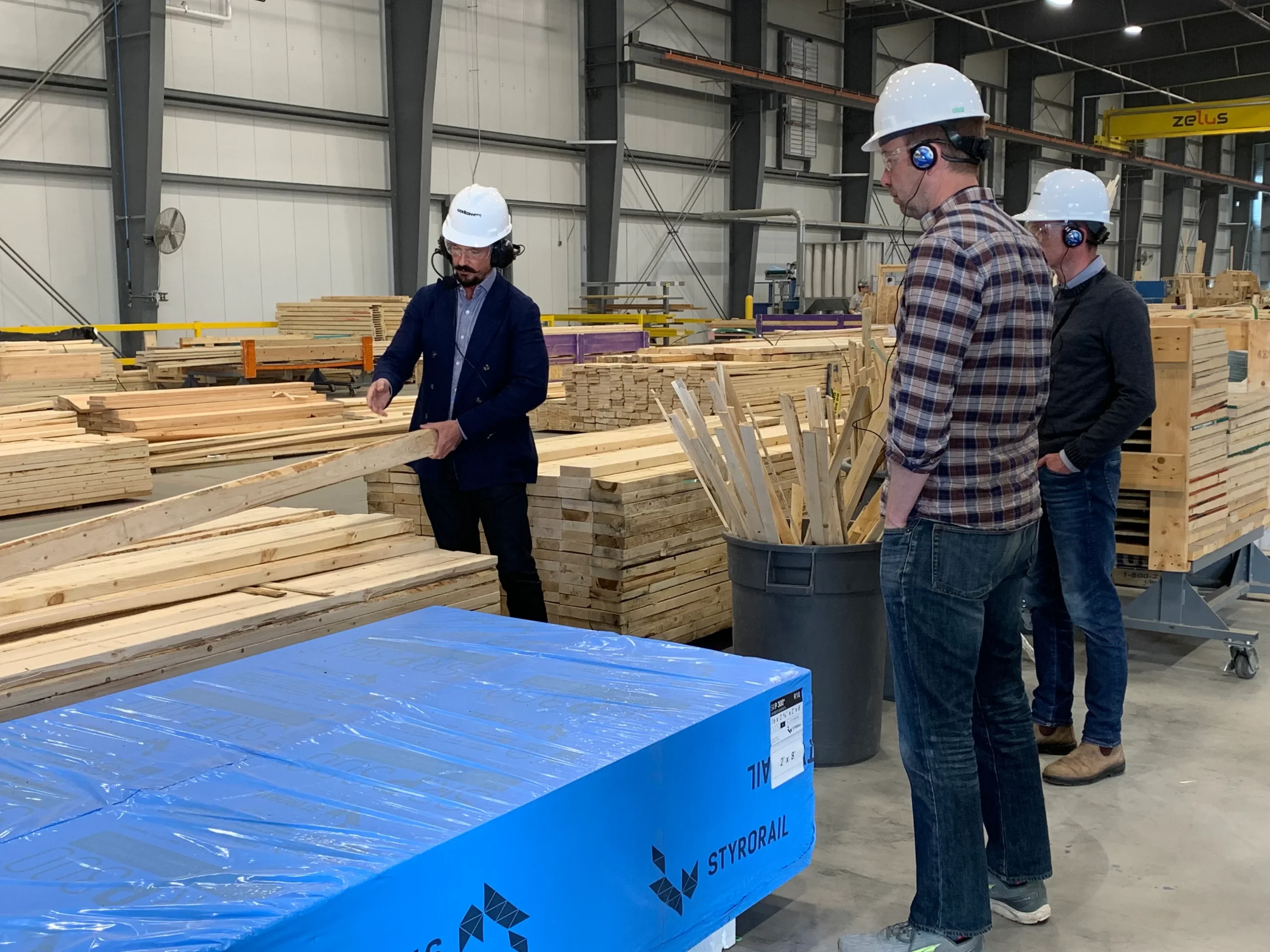 Frank Cairo shows home building materials at Caivan’s manufacturing facility